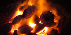 stir coal in the fireplace, make a fire sound 