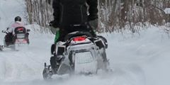 Snowmobile leaves quickly sound , 2 sounds