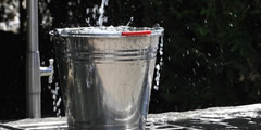 Water flows into a bucket